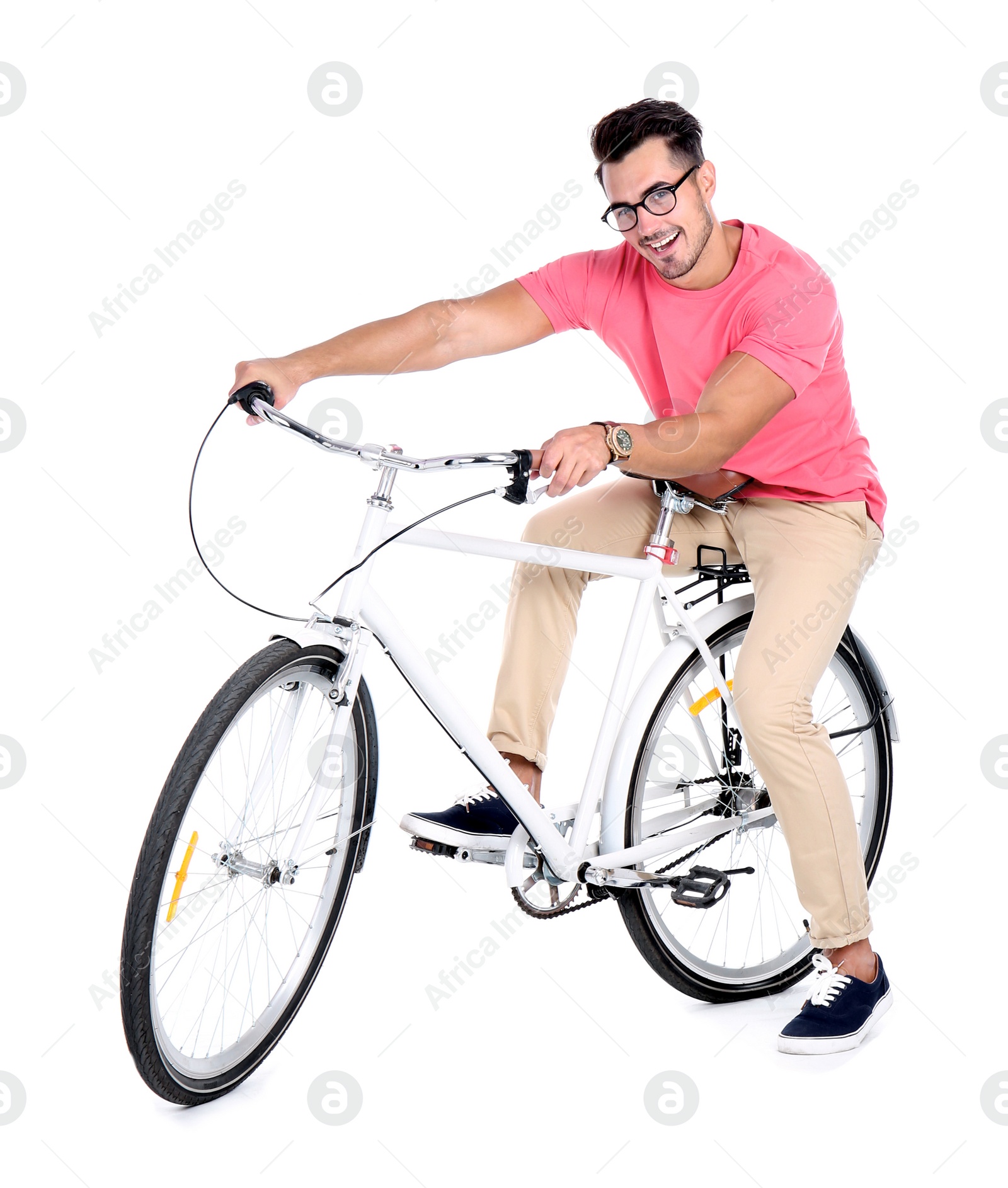 Photo of Handsome young hipster man with bicycle on white background