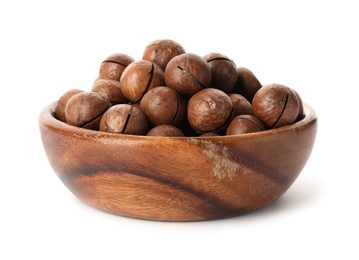 Photo of Bowl with organic Macadamia nuts on white background