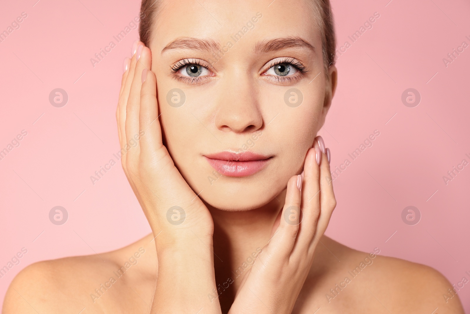 Photo of Portrait of beautiful young woman on color background. Lips contouring, skin care and cosmetic surgery concept