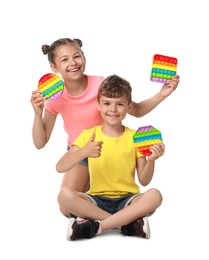 Children with pop it fidget toys on white background