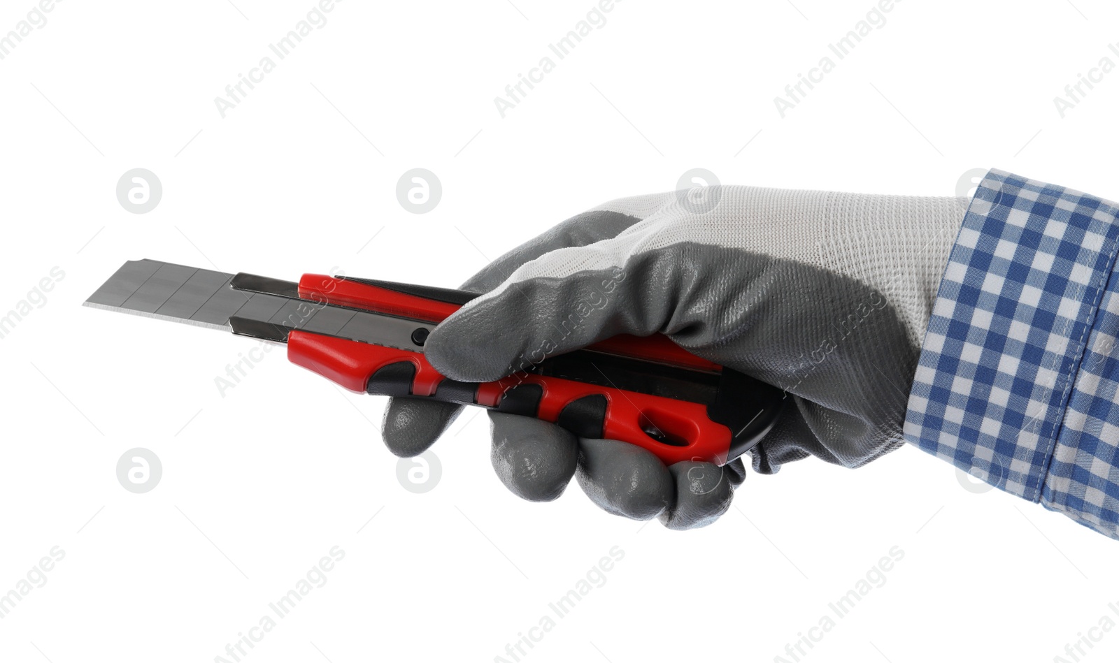 Photo of Worker holding utility knife on white background, closeup