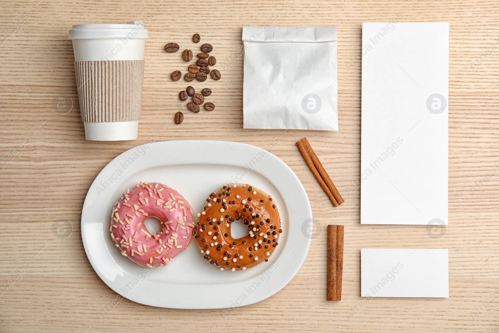 Photo of Flat lay composition with items for mock up design on wooden background. Food delivery service