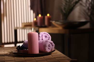 Beautiful composition with different spa products on wicker bench indoors, space for text