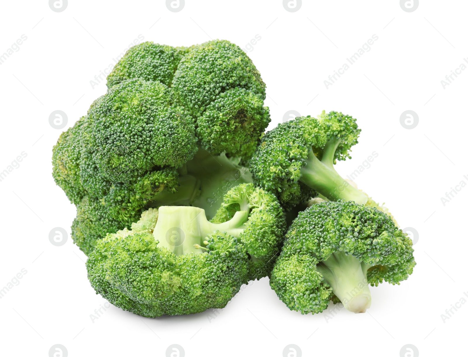 Photo of Pile of fresh raw green broccoli isolated on white