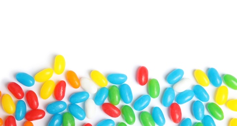 Colorful jelly beans on white background, top view