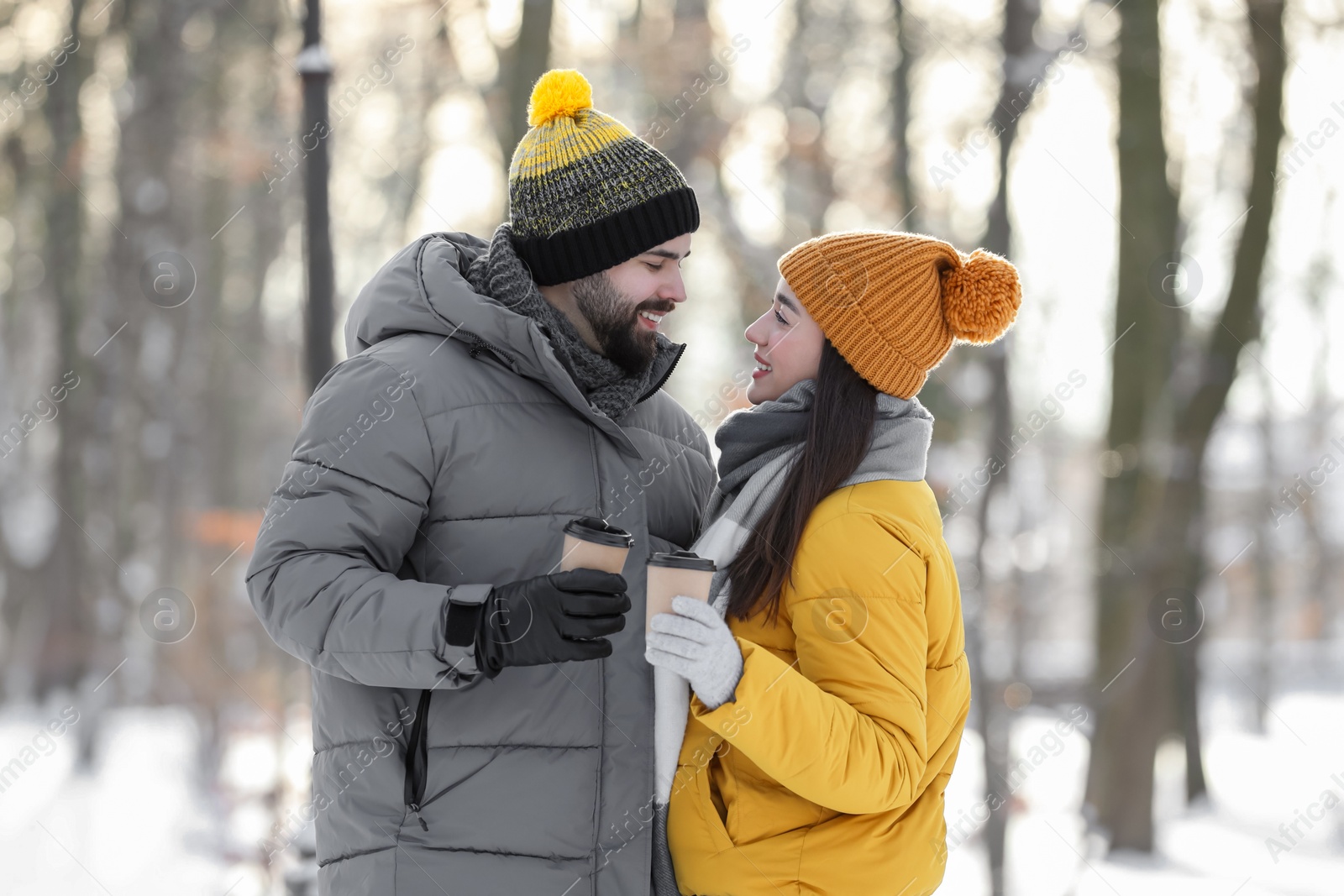 Photo of Beautiful young couple enjoying winter day outdoors