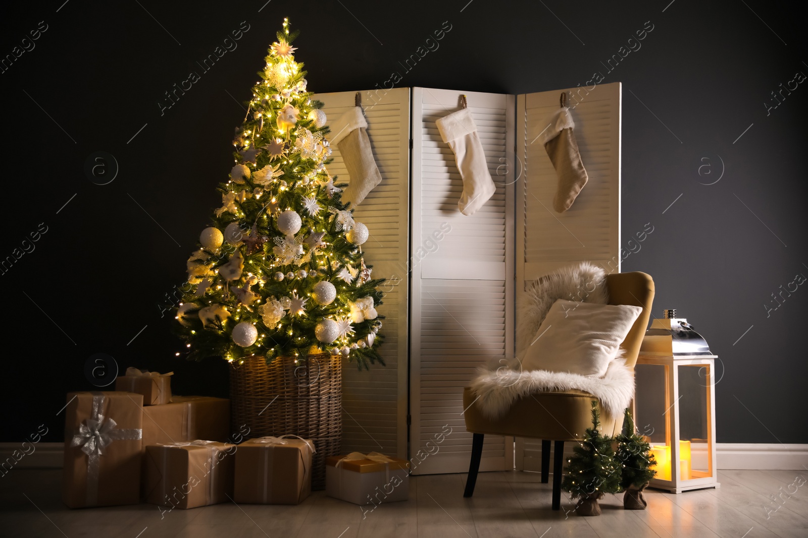 Photo of Beautiful Christmas themed photo zone. Cozy living room interior imitation