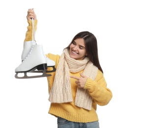 Photo of Happy woman with ice skates on white background