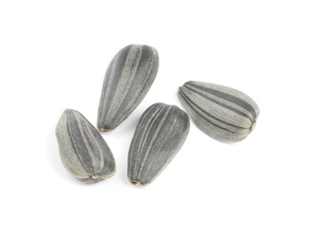 Raw organic sunflower seeds isolated on white