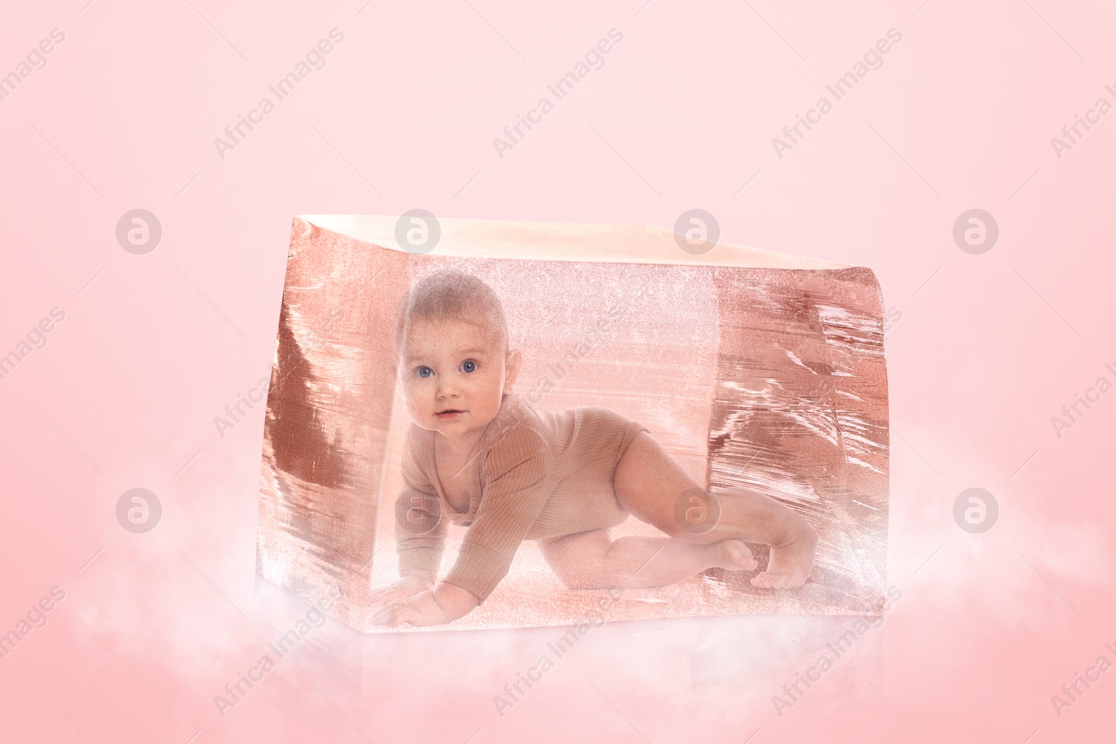 Image of Cryopreservation as method of infertility treatment. Baby in ice cube on pink background