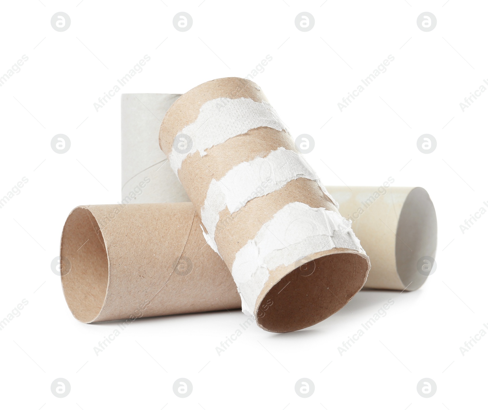 Photo of Empty toilet paper rolls on white background