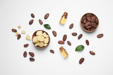 Photo of Composition with organic cocoa butter on white background, top view
