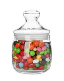 Many tasty candies in glass jar isolated on white
