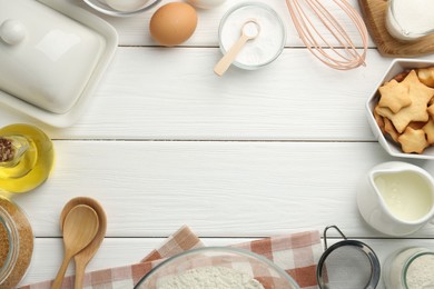 Photo of Frame of many different products on white wooden table, flat lay. Space for text