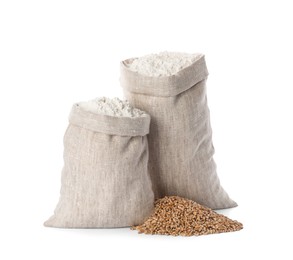 Sacks with flour and grains on white background