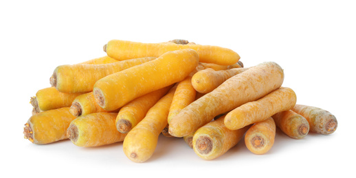 Photo of Fresh raw yellow carrots isolated on white