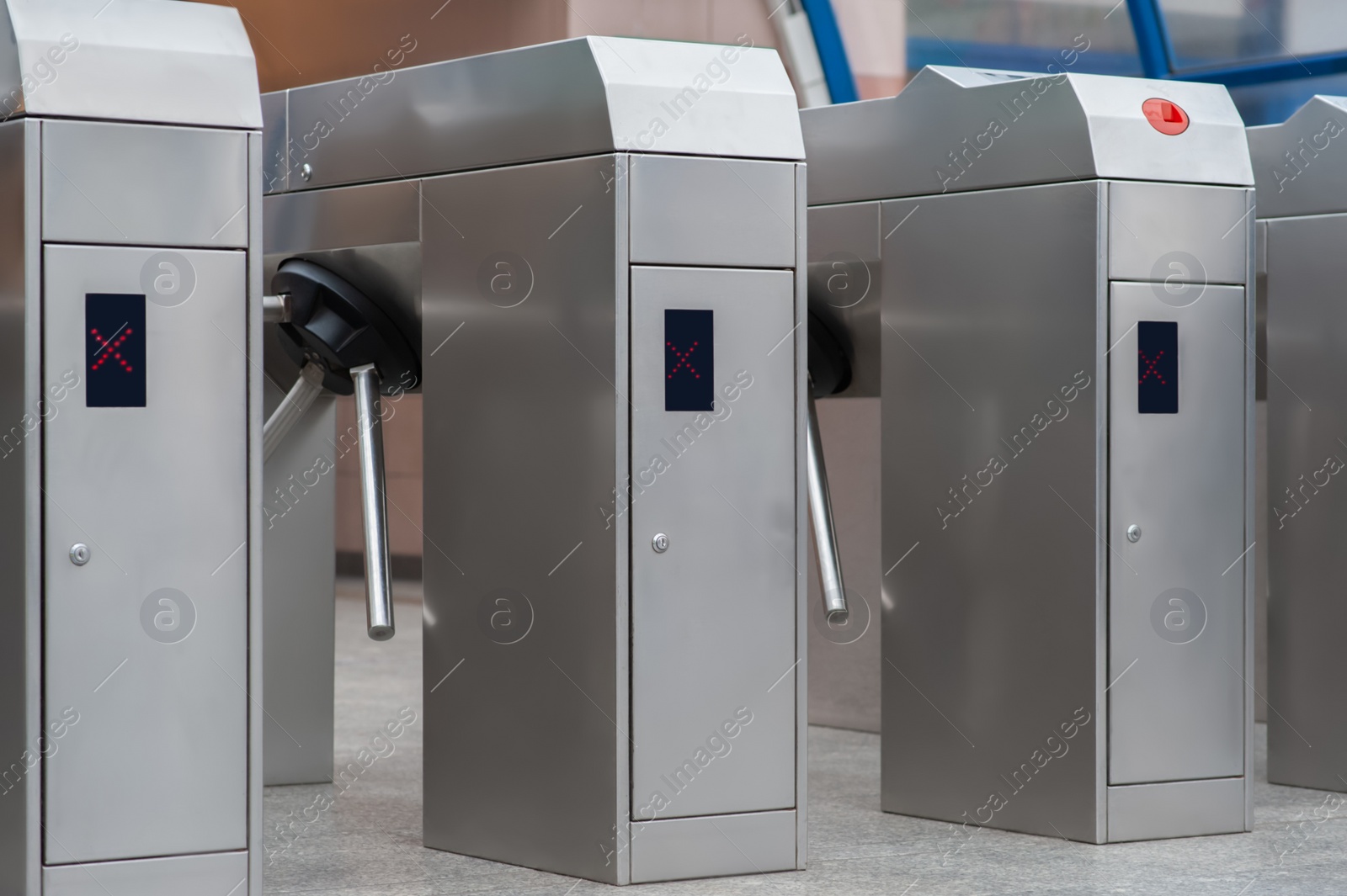 Photo of Many modern turnstiles, closeup view. Fare collection system