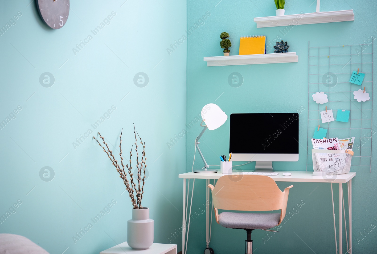 Photo of Comfortable workplace with computer on desk in home office