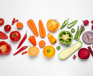 Different fresh vegetables on white background, top view