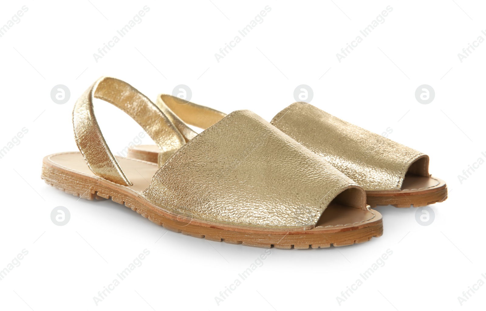 Photo of Pair of female shoes on white background