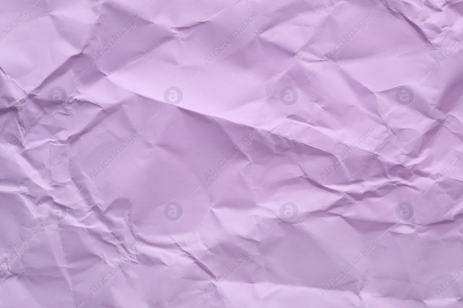 Photo of Sheet of color crumpled paper as background. Space for design