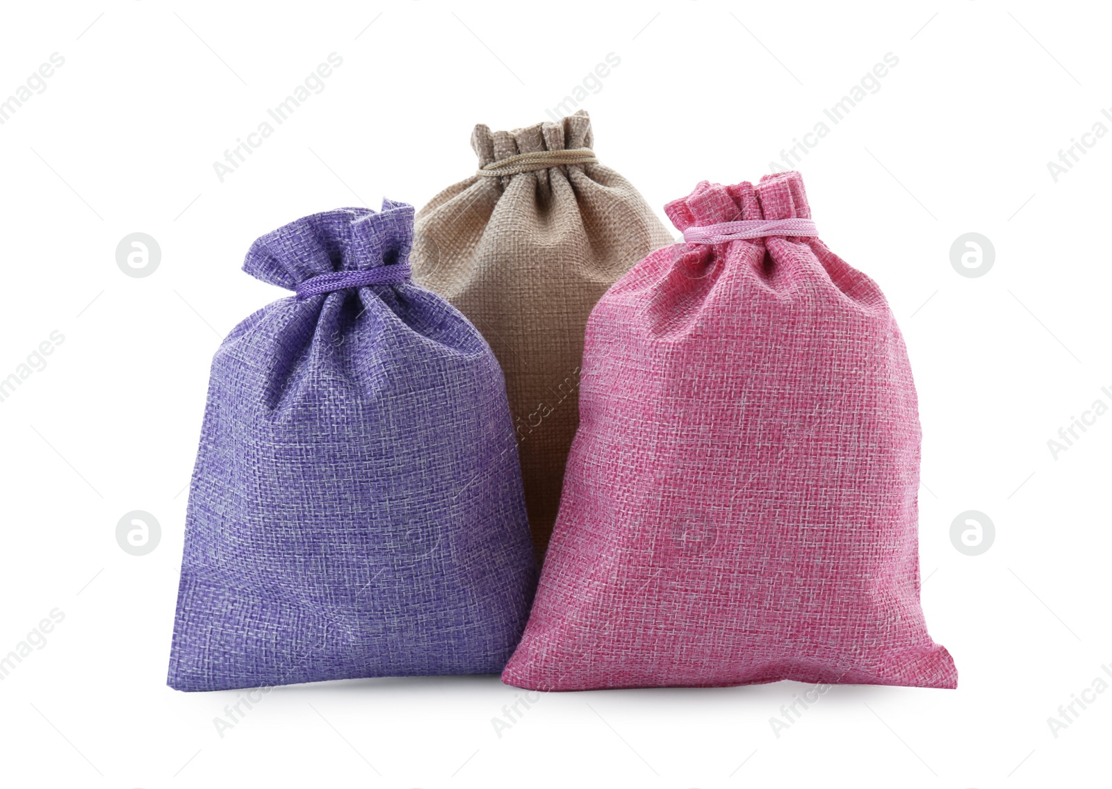 Photo of Many tied burlap bags isolated on white