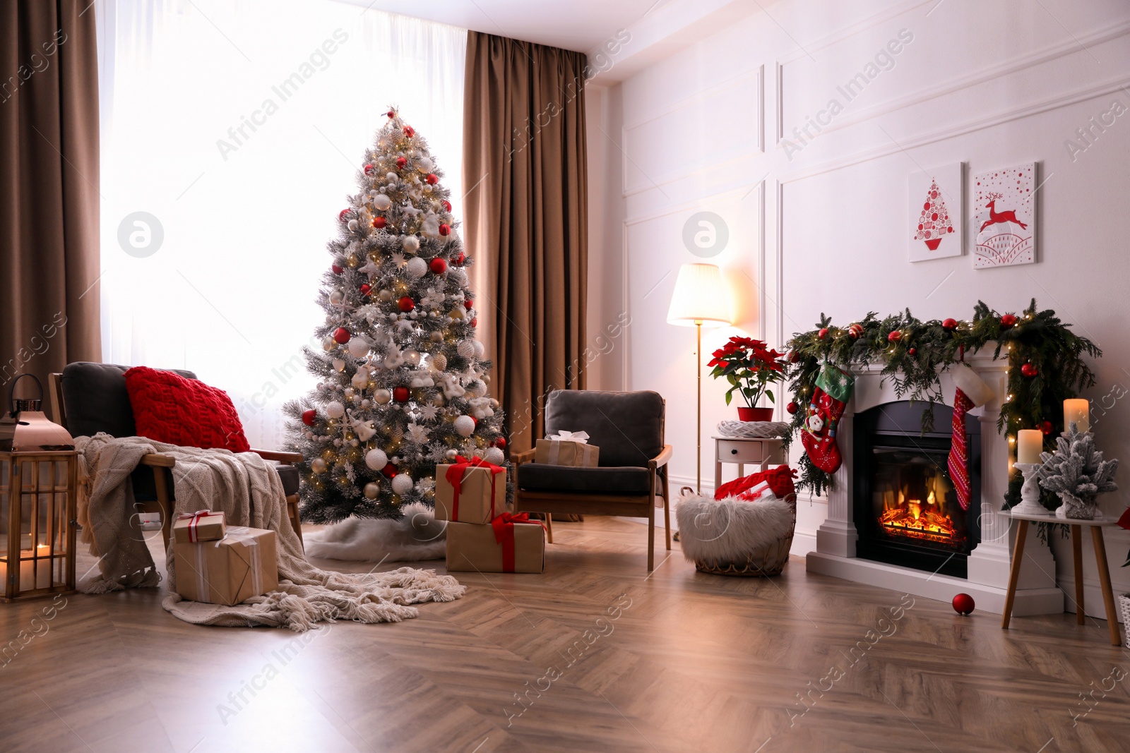 Photo of Stylish room interior with fireplace and beautiful Christmas tree