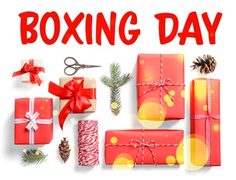Image of Flat lay composition with gifts and text Boxing Day on white background