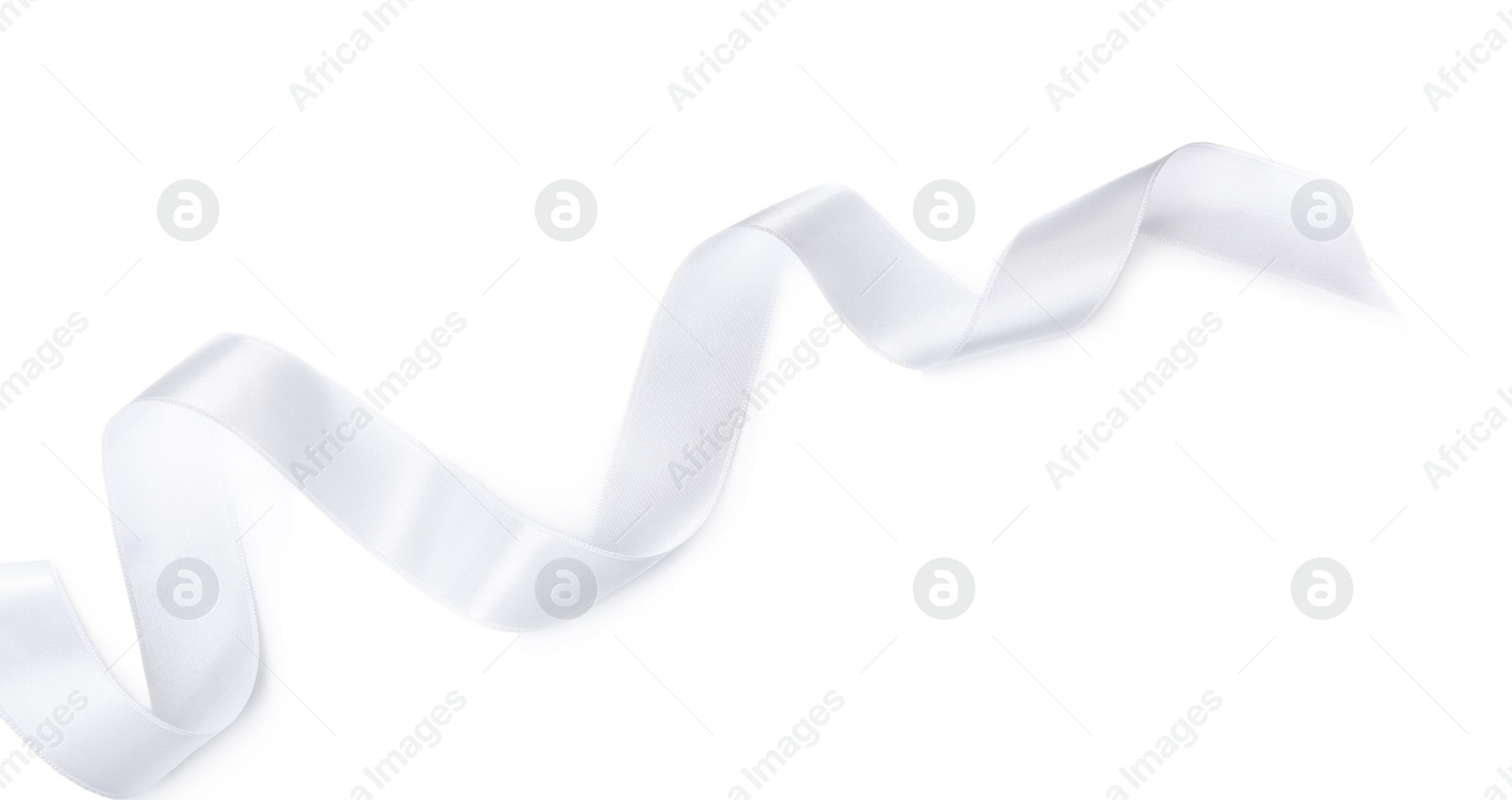 Photo of Satin ribbon on white background, top view