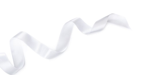 Photo of Satin ribbon on white background, top view