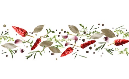 Many different spices flying on white background