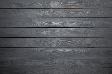 Photo of Texture of grey wooden surface as background, top view