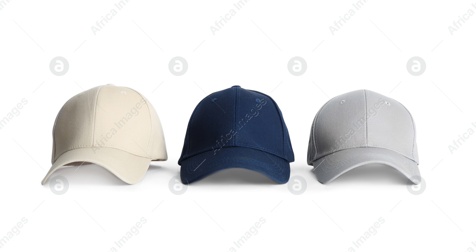 Photo of Baseball caps on white background. Mock up for design