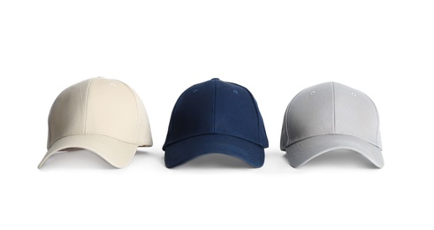 Photo of Baseball caps on white background. Mock up for design