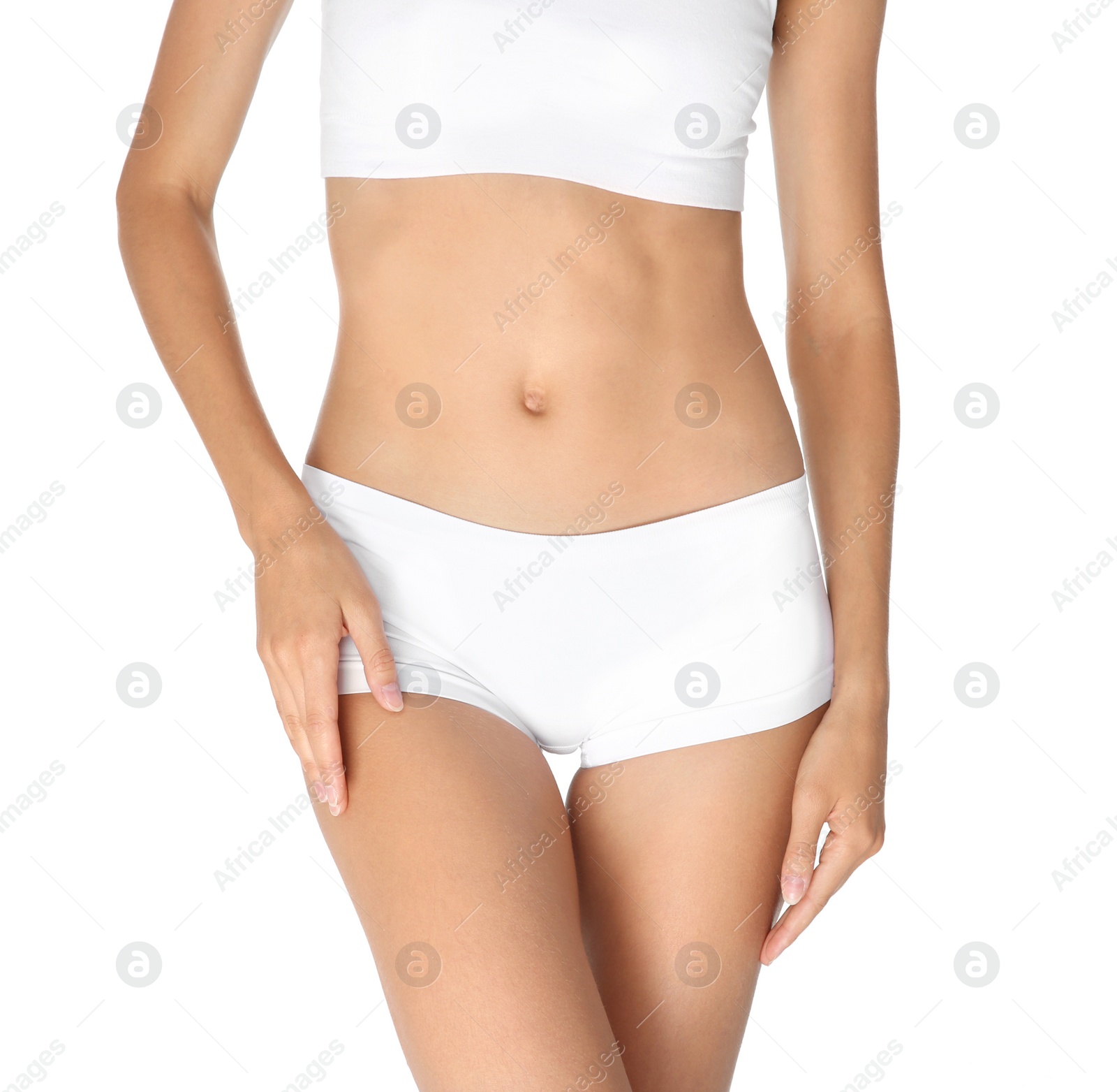 Photo of Young slim woman in underwear on white background. Weight loss diet