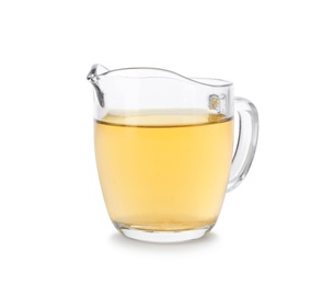 Photo of Apple vinegar in glass pitcher on white background