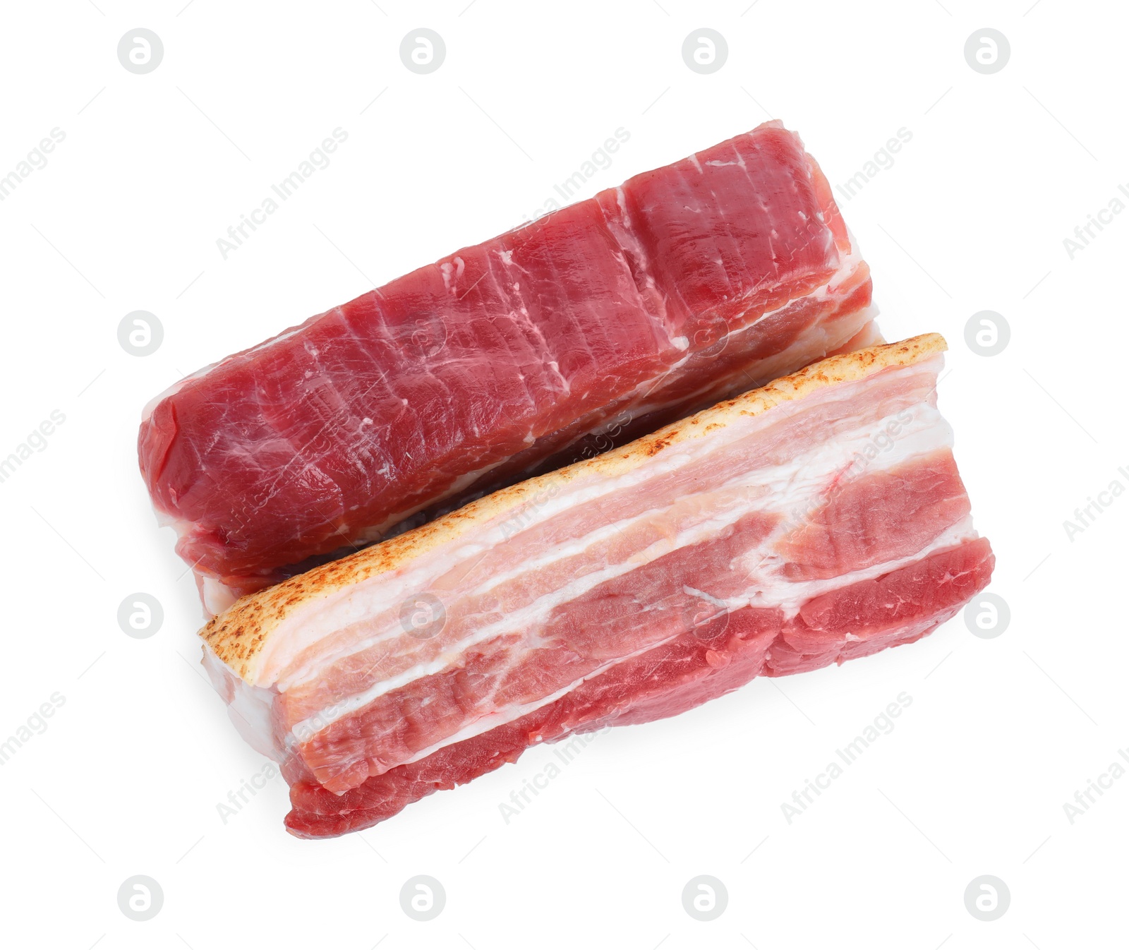 Photo of Pieces of raw pork belly isolated on white, top view