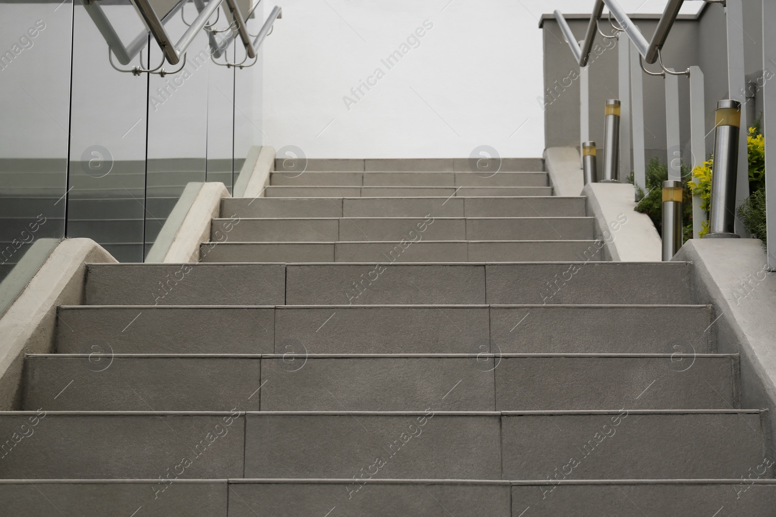 Photo of Outdoor staircase with metal handrails on city street