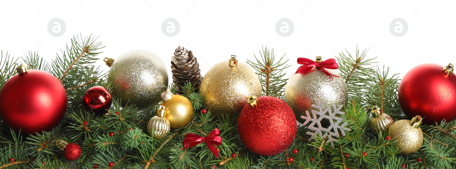 Photo of Fir tree branches with Christmas decoration on white background