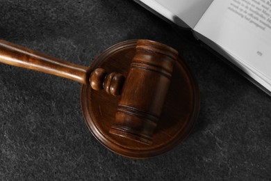 Photo of Law concept. Gavel and book on grey textured table, top view