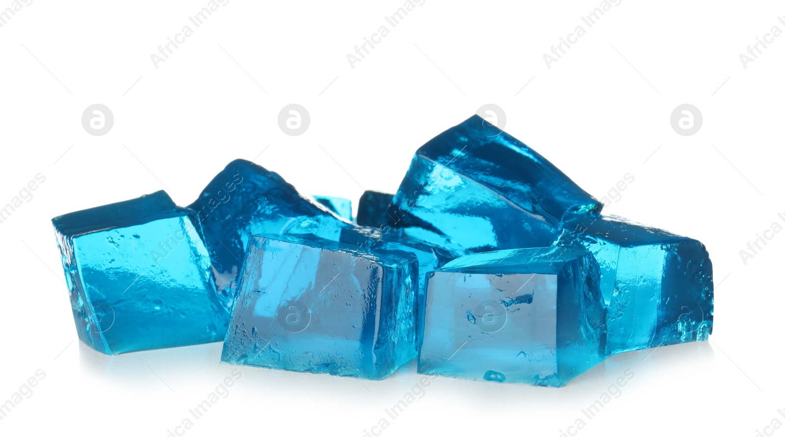 Photo of Heap of blue jelly cubes on white background