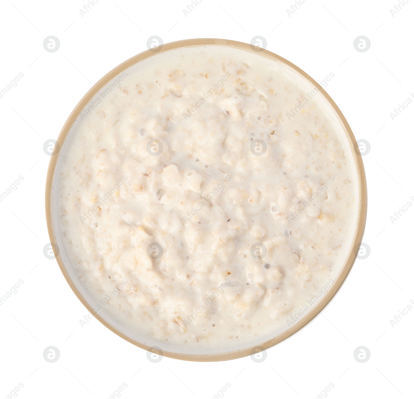 Photo of Tasty boiled oatmeal in bowl isolated on white, top view