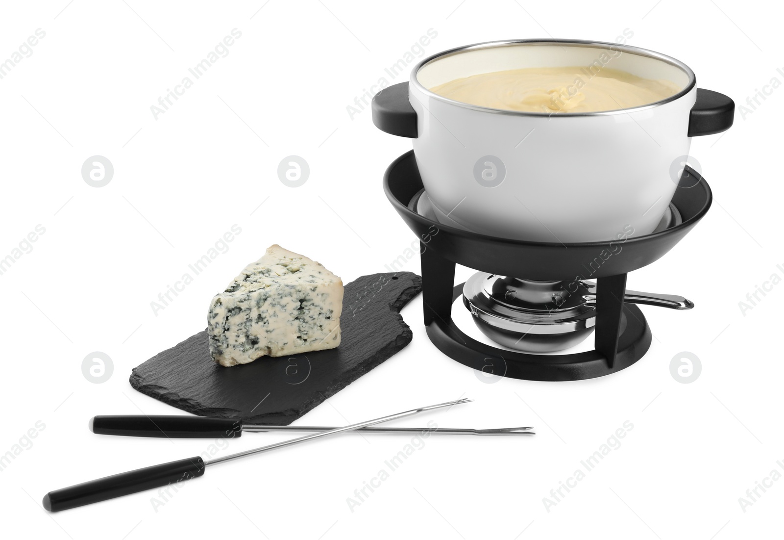 Photo of Fondue with tasty melted cheese, forks and piece isolated on white