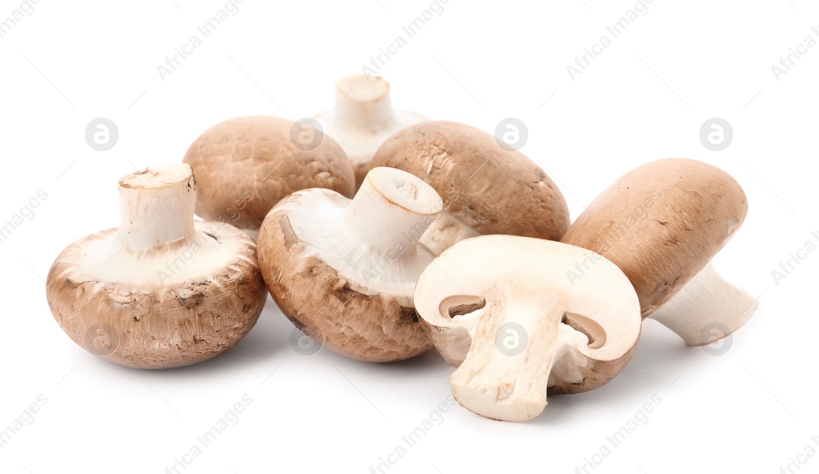 Photo of Fresh raw champignon mushrooms on white background