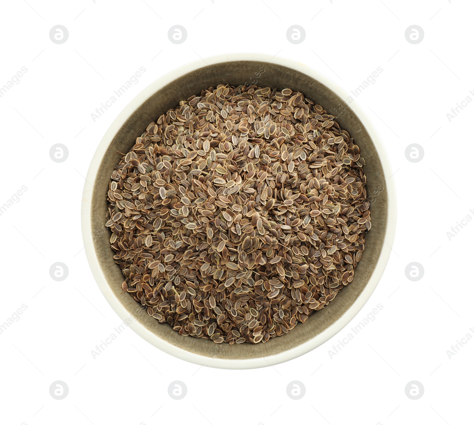 Photo of Bowl of dry dill seeds isolated on white, top view