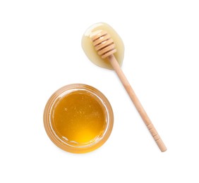 Photo of Tasty honey in glass jar and dipper on white background, top view. Space for text