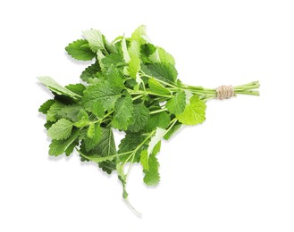 Photo of Bunch of fresh green lemon balm isolated on white, top view