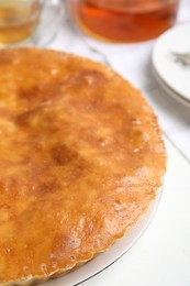 Photo of Delicious pie with meat on white table