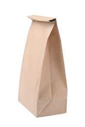Photo of Closed kraft paper bag isolated on white
