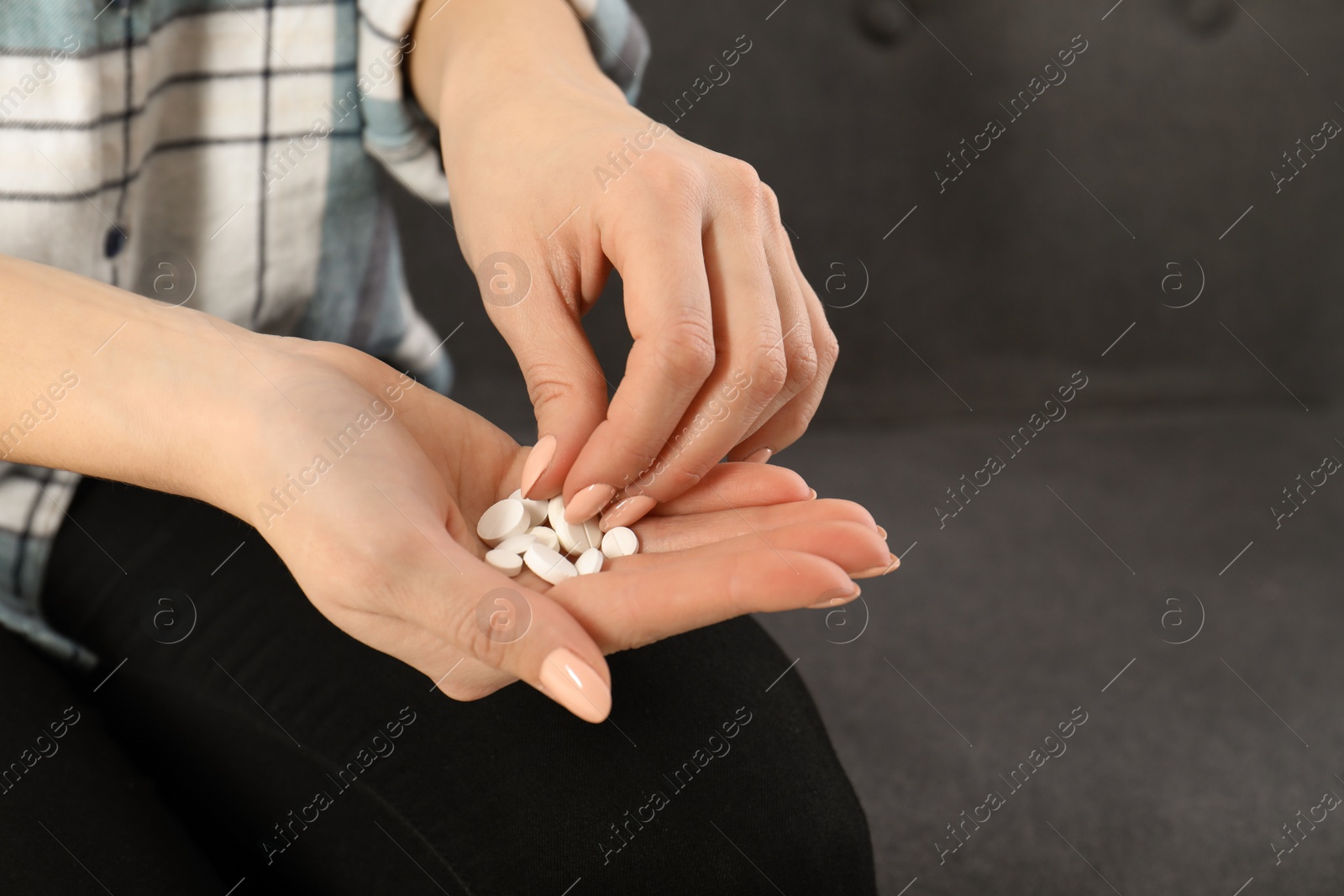 Photo of Woman taking medicine, closeup view. Health care